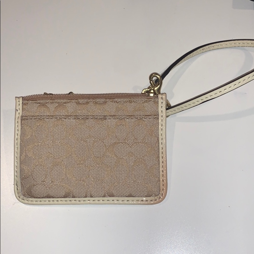 Used Coach mini wristlet